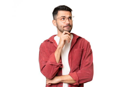 Young handsome caucasian man over isolated chroma key background having doubts and thinking