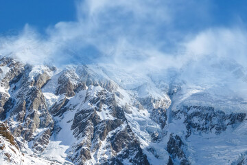 Fototapeta na wymiar Clouds around the Nanga Parbat well know as the Killer mountain in the Himalaya range in the Pakistan