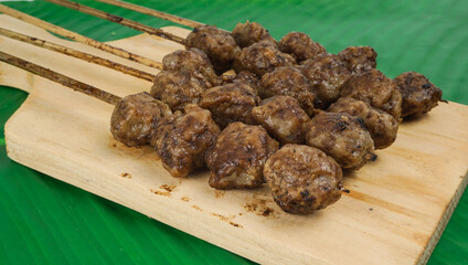 Homemade Bakso Bakar, Indonesian Chicken Meatball grilled. selective focus concept