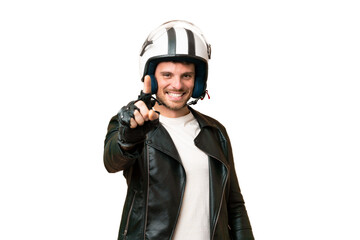 Brazilian man with a motorcycle helmet over isolated chroma key background showing and lifting a...