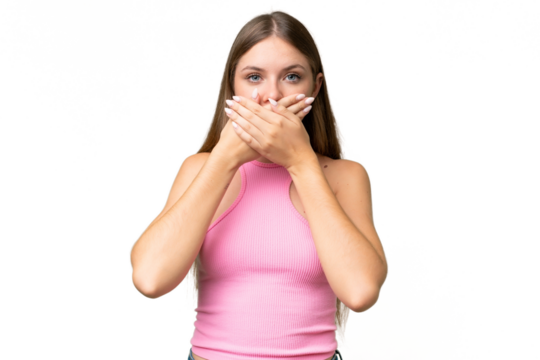 Young beautiful blonde woman over isolated background covering mouth with hands