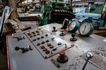 Control panel with buttons and pressure gauge