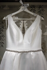 wedding dress on hangers