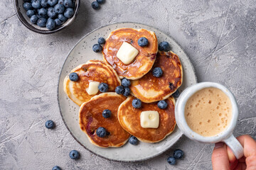 Buttermilk blueberry pancakes with maple syrup
