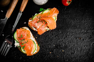 A flavorful salmon sandwich on the table. 