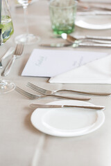 set table with plates and glasses in the restaurant