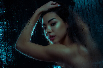 Photo of stunning gentle lady have bath time haircut washing isolated on dark background with water...