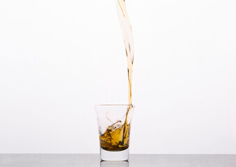 drink pouring into glass on