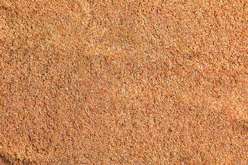 Texture of cumin powder close up. Spices or condiments as background