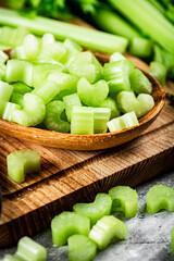 Sliced celery on a cutting board. 