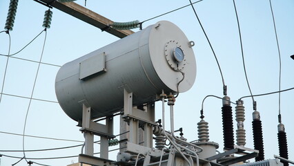 Power transformer. Electrical equipment. Electric substation. High voltage transformer against the...