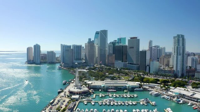 Aerial drone city tour 4k Miami. Drone View Downtown Miami. Aerial over Miami Beach, FL and Ocean Drive. Aerial drone footage flying directly above a city. 