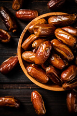 Ripe dates on a plate. 