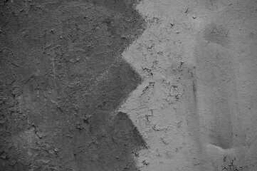 gray wall close-up, in the photo the wall is covered with gray plaster