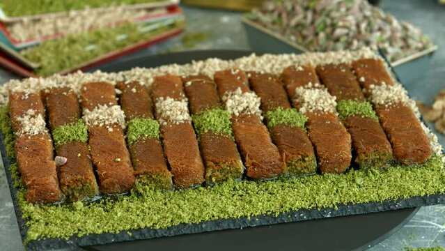 Traditional turkish baklava pistachio pastry. Dilberdudagi, ozel kesim baklava, cikolatali baklava, fistikli baklava, katmer, fistikli kadayif, kattafi, fistik sarma, soguk baklava, midye baklava, cev