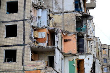 Russian missile strike on apartment building in Dnipro, Ukraine. Rocket destroyed house. Russia war invasion in Ukraine