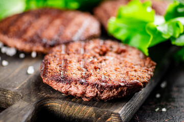 Fragrant grilled burger with greens. 