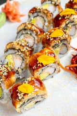 Salmon sushi bathed in oyster sauce