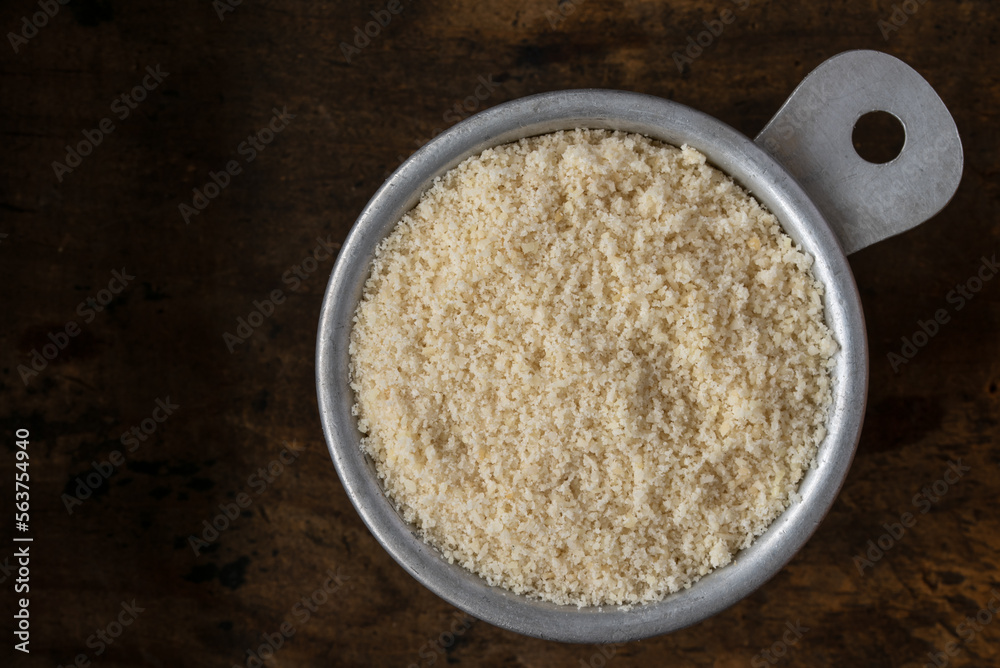 Wall mural Almond Flour in a Measuring Cup