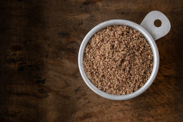 Ground Flaxseed in a Measuring Cup