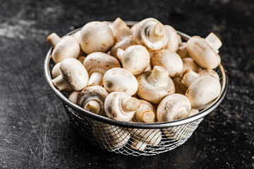 Fresh mushrooms in a colander. 