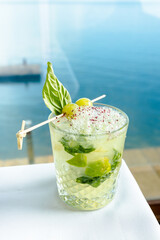 Daisy with mint with the background of the sea