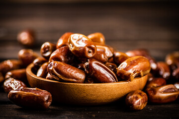 Ripe dates on a plate. 