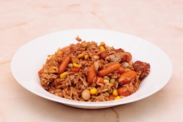 Rice with sauce and vegetables