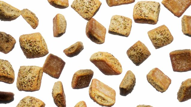 Looping animation featuring a cloud of Nutty Breads floating in place on a featureless white background.