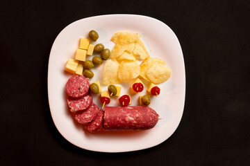 Picada with a variety of cheeses, meat and cherries