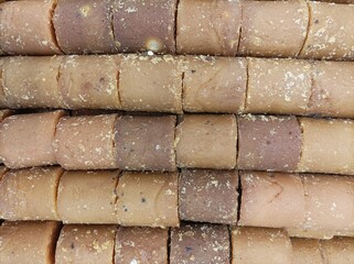 A pile of Brown sugar or gula jawa, sweet, traditional seasoning from Indonesia, usually for cooking