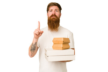 Adult man holding fast food delivery packages isolated cut out showing number one with finger.