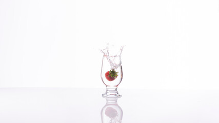 Strawberry drink explosion with white background