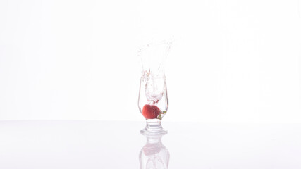 Strawberry drink explosion with white background