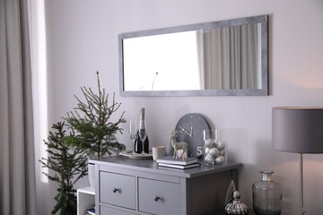 Beautiful room interior decorated for Christmas with potted firs