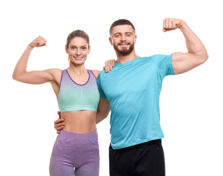 Athletic people showing muscles on white background