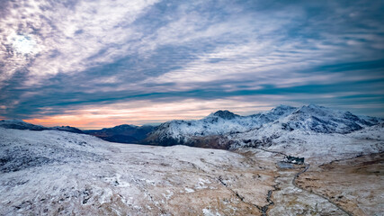 Snowdonia, Wales (UK), Winter 2023. Aerial landscapes of snow and mountains.