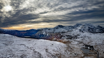 Snowdonia, Wales (UK), Winter 2023. Aerial landscapes of snow and mountains.