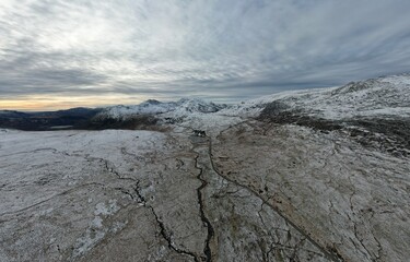 Snowdonia, Wales (UK), Winter 2023. Aerial landscapes of snow and mountains.