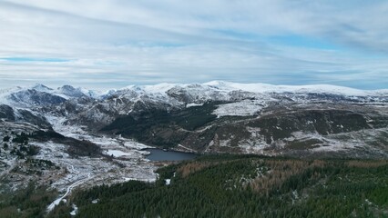 Snowdonia, Wales (UK), Winter 2023. Aerial landscapes of snow and mountains.