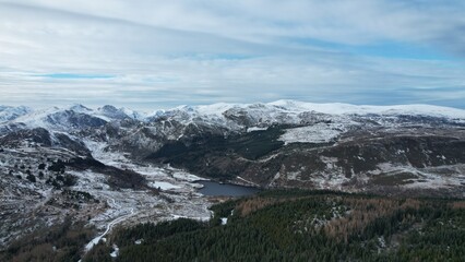 Snowdonia, Wales (UK), Winter 2023. Aerial landscapes of snow and mountains.