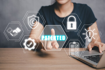 Patent concept, Person hand touching button with patented icon on vr screen, Patent Copyright Law...