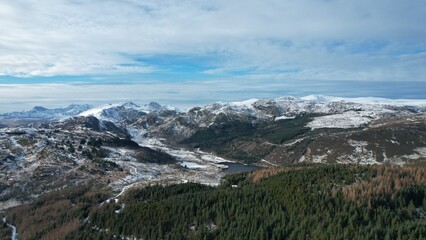 Snowdonia, Wales (UK), Winter 2023. Aerial landscapes of snow and mountains.