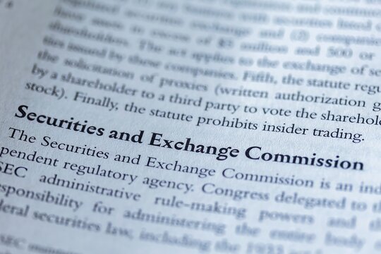 Legal Or Law Book With SEC Or Securities And Exchange Commission Focused In Closeup Of Explanation 