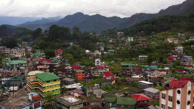 Town of Sagada in the valley among the mountains covered with forest. Philippines.