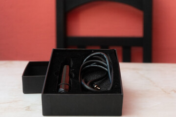 Black and green rotary tattoo machine