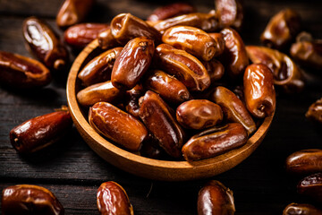 Ripe dates on a plate. 
