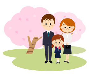 満開の桜と笑顔の新一年生の家族