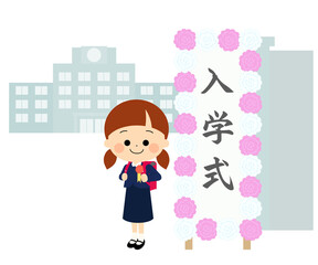 校門前の入学式の看板と笑顔の新一年生
