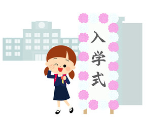 入学式の看板と笑顔でポーズを決める新一年生